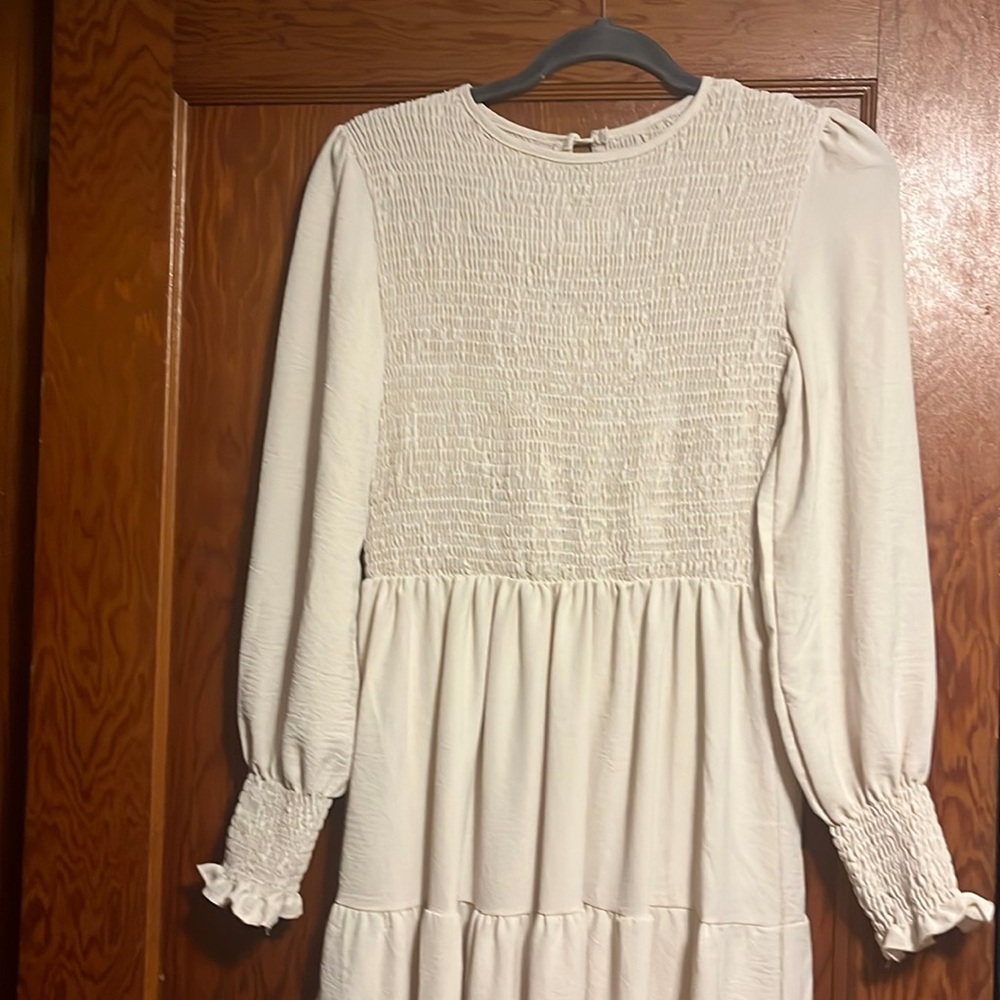 Cream long sleeved dress
